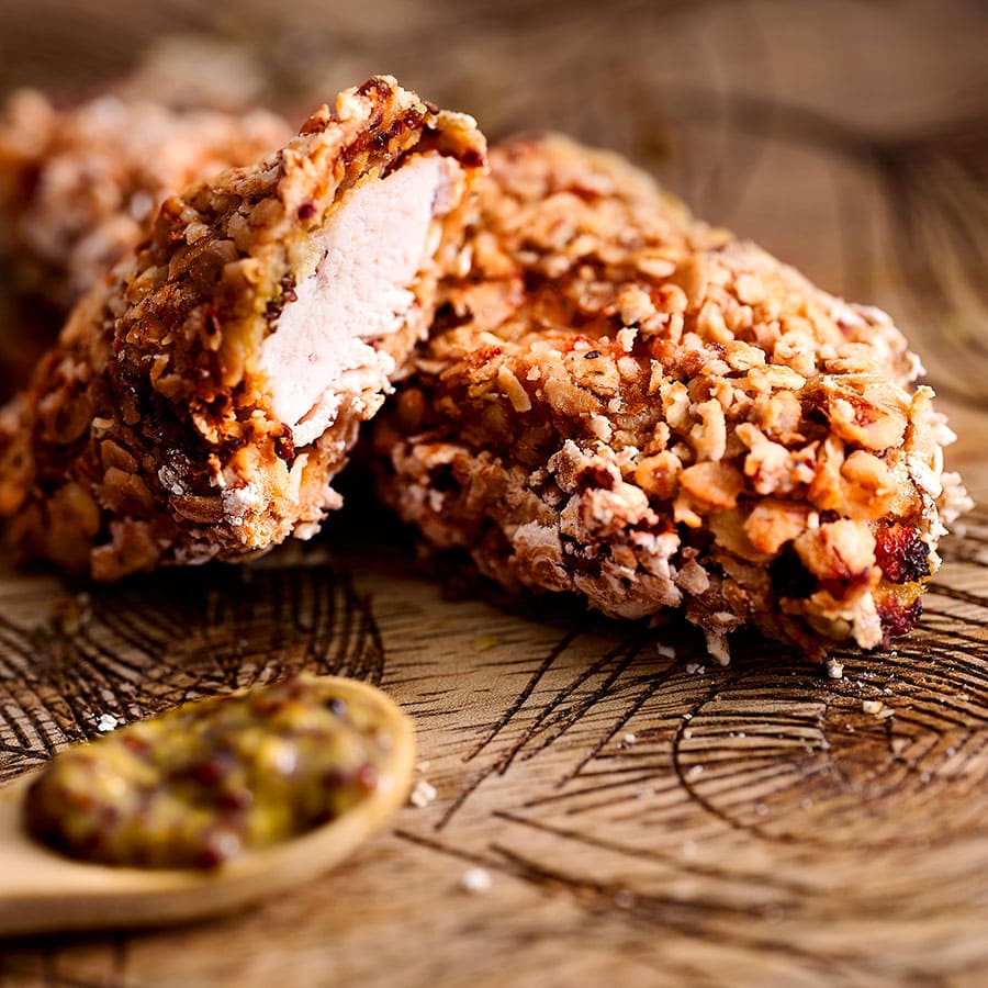 Aiguillettes de poulet panées a la moutarde à l'ancienne au miel.