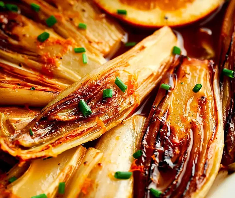 Endives braisées au miel et à l’orange – recette à la poêle