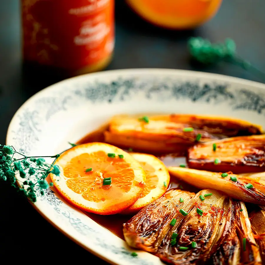 Endives braisées au miel et à l’orange prêtes à servir.